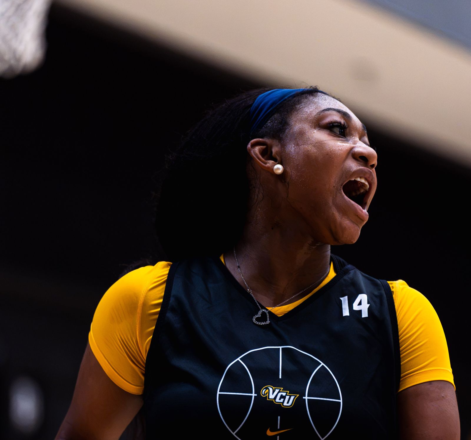 A VCU women’s basketball player calls out during a practice drill